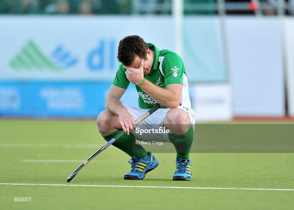 18 March 2012; A dejected John Jackson, Ireland, after the game. Men’s 2012 Olympic Qualifying Tournament Final, Ireland v Korea. National Hockey Stadium, UCD, Belfield, Dublin. Picture credit: Barry Cregg / SPORTSFILE