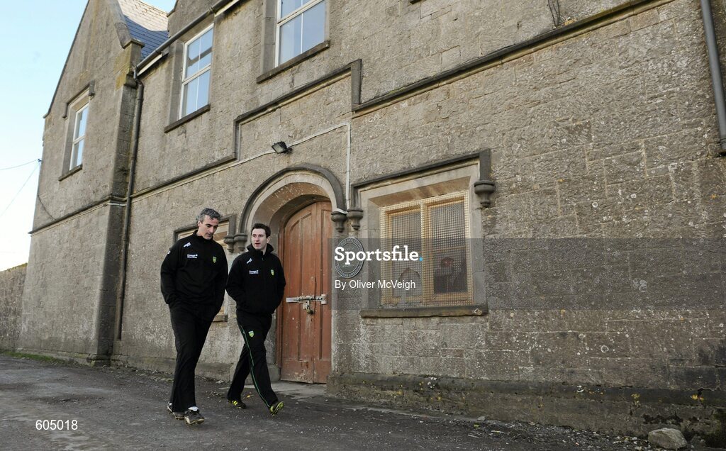 18 March 2012; Donegal manager Jim McGuinness and assistant manager Rory Gallagher go past the Ballyshannon workhouse on their way to the team warm up. Allianz Football League, Division 1, Round 5, Donegal v Mayo, Fr. Tierney Park, Ballyshannon, Donegal. Picture credit: Oliver McVeigh / SPORTSFILE