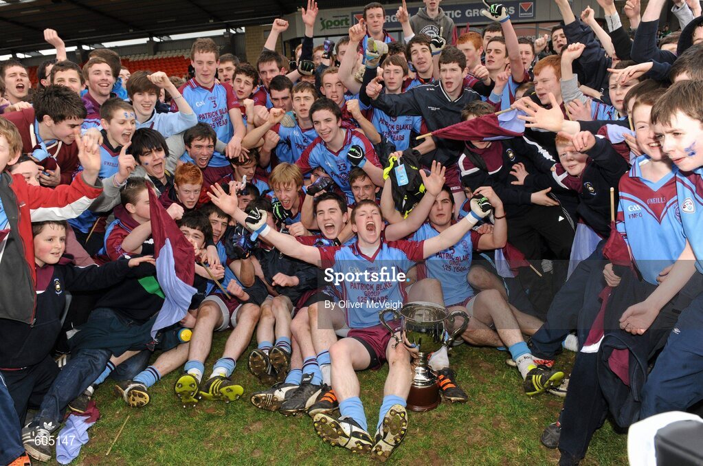 19 March 2012; The St. Michael’s, Enniskillen, team and supporters celebrate with the cup after the game. MacRory Cup Final, St. Patrick’s, Maghera v St. Michael’s, Enniskillen, Bessbrook, Morgan Athletic Grounds, Armagh. Picture credit: Oliver McVeigh / SPORTSFILE