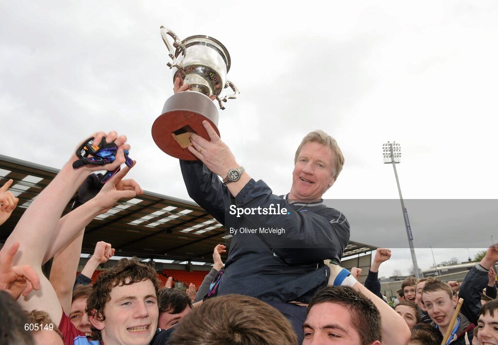 19 March 2012; St. Michael’s, Enniskillen, manager Dominic Corrigan celebrates with the cup after the game. MacRory Cup Final, St. Patrick’s, Maghera v St. Michael’s, Enniskillen, Bessbrook, Morgan Athletic Grounds, Armagh. Picture credit: Oliver McVeigh / SPORTSFILE
