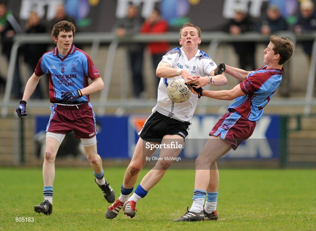 19 March 2012; Conor Murphy, St. Patrick’s, Maghera, in action against Rory Brennan, left, and Leo Cullen, St. Michael’s, Enniskillen. MacRory Cup Final, St. Patrick’s, Maghera v St. Michael’s, Enniskillen, Bessbrook, Morgan Athletic Grounds, Armagh. Picture credit: Oliver McVeigh / SPORTSFILE