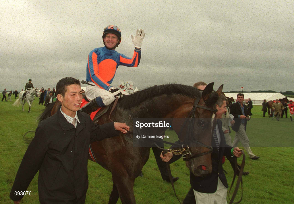 30 June 2002; Jockey Mick Kinane on High Chaparral celebrates after winning the Budweiser Irish Derby at The Curragh Racecourse in Kildare. Photo by Damien Eagers/Sportsfile