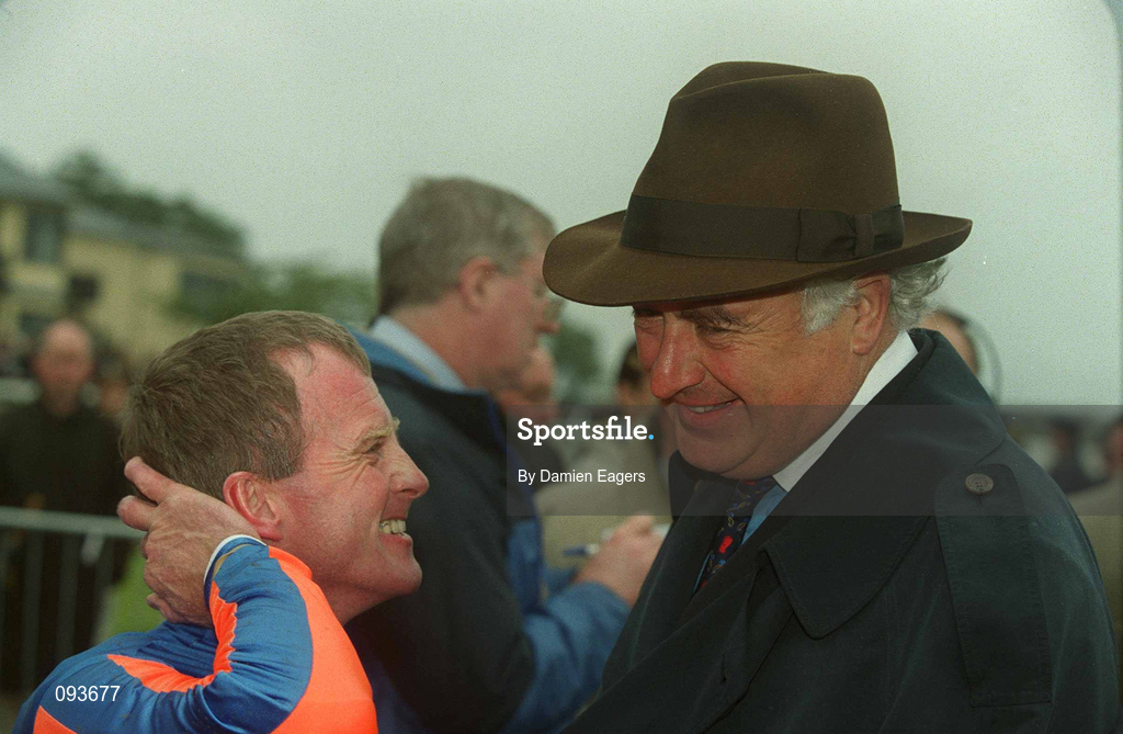 30 June 2002; Jockey Mick Kinane with John Magnier after Hugh Chaparral had won the Budweiser Irish Derby at The Curragh Racecourse in Kildare. Photo by Damien Eagers/Sportsfile