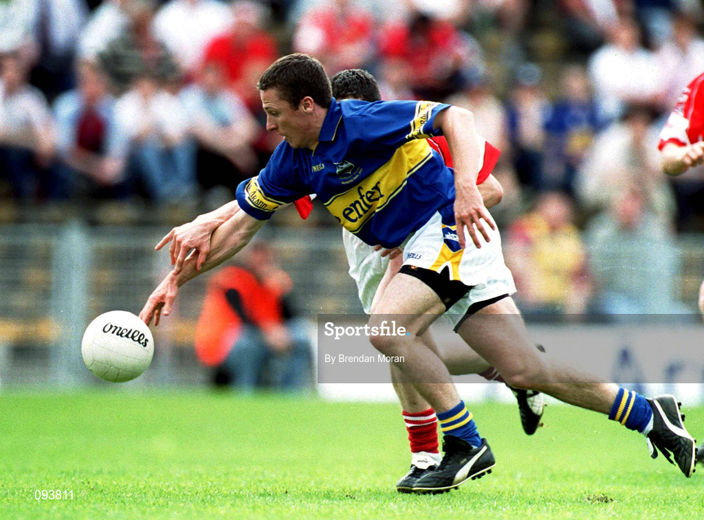 14 July 2002; Declan Browne of Tipperary in action against Graham Canty of Cork during the Bank of Ireland Munster Senior Football Championship Final match between Cork and Tipperary at Semple Stadium in Thurles, Tipperary. Photo by Brendan Moran/Sportsfile
