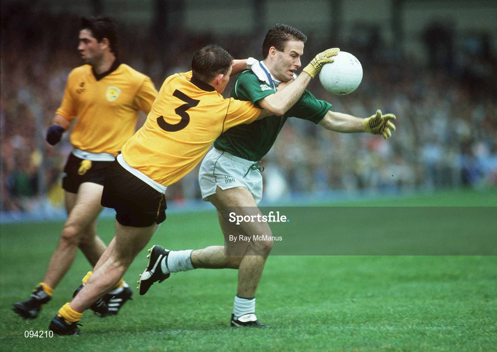 19 August 1990; Bernard Flynn of Meath is tackled by Matt Gallagher of Donegal during the All-Ireland Senior Football Championship Semi-Final match between Meath and Donegal at Croke Park in Dublin. Photo by Ray McManus/Sportsfile