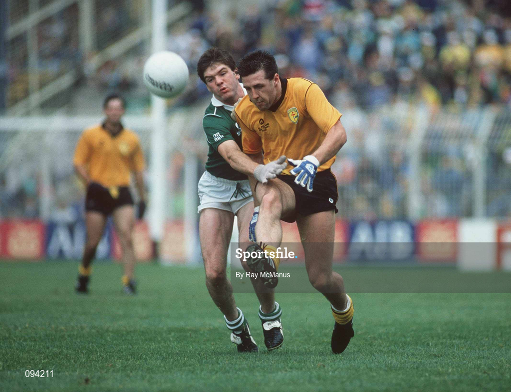 19 August 1990; Brian Murray of Donegal is tackled by PJ Gillic of Meath during the All-Ireland Senior Football Championship Semi-Final match between Meath and Donegal at Croke Park in Dublin. Photo by Ray McManus/Sportsfile