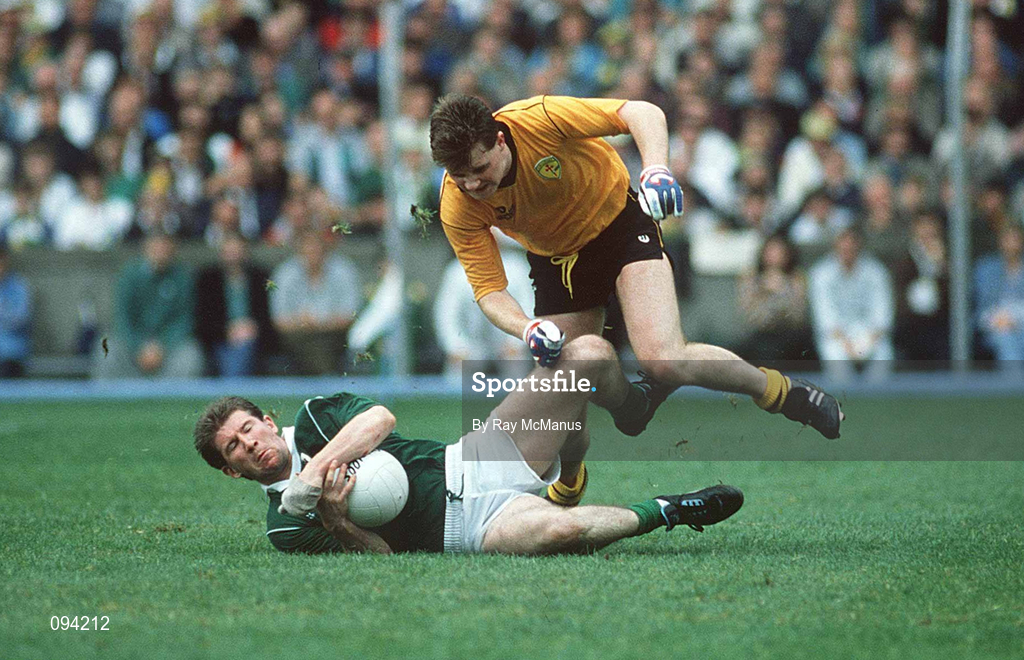 19 August 1990; Robbie O'Malley of Meath is tackled by Manus Boyle of Donegal during the All-Ireland Senior Football Championship Semi-Final match between Meath and Donegal at Croke Park in Dublin. Photo by Ray McManus/Sportsfile