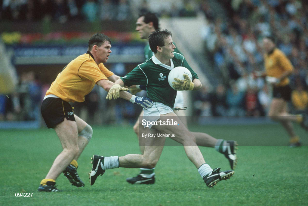 19 August 1990; Bernard Flynn of Meath is tackled by Matt Gallagher of Donegal during the All-Ireland Senior Football Championship Semi-Final match between Meath and Donegal at Croke Park in Dublin. Photo by Ray McManus/Sportsfile