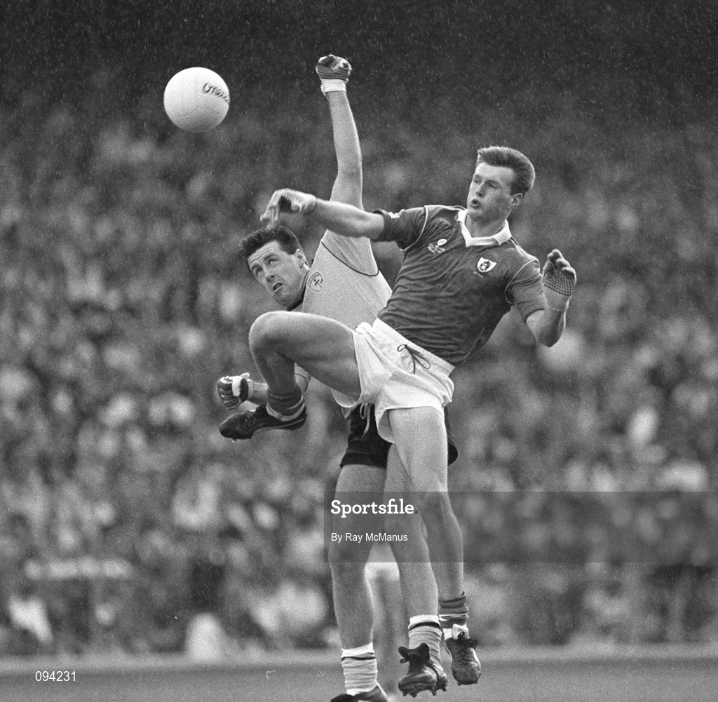 19 August 1990; Brian Murray of Donegal is tackled by Colm Brady of Meath during the All-Ireland Senior Football Championship Semi-Final match between Meath and Donegal at Croke Park in Dublin. Photo by Ray McManus/Sportsfile
