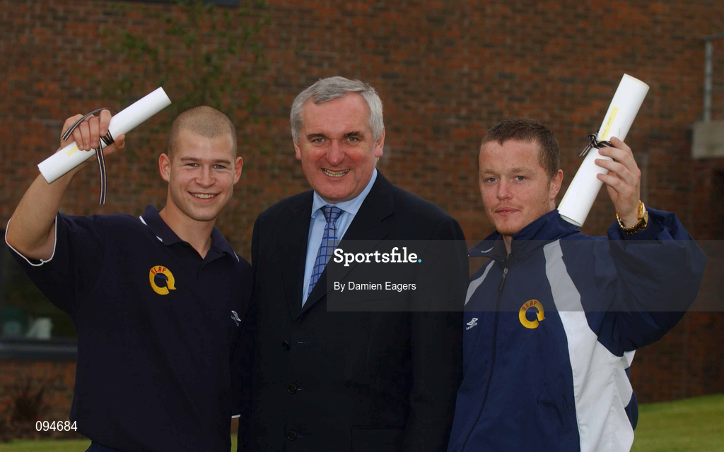 24 July 2002; Participants Paul Fenton, left, and Seamus Crowe with An Taoiseach Bertie Ahern, at the FAI/DCU Diploma Programme presentation ceremony after completing a six week programme at DCU. Photo by Damien Eagers/Sportsfile