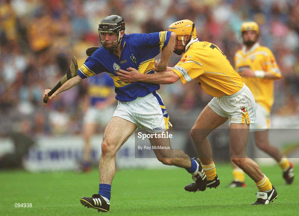 28 July 2002; Eoin Kelly of Tipperary is tackled by Ciarán Herron of Antrim during the All-Ireland Senior Hurling Championship Quarter-Final match between Antrim and Tipperary at Croke Park in Dublin. Photo by Ray McManus/Sportsfile