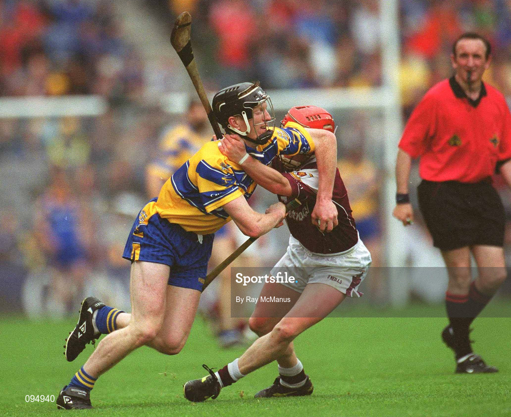 28 July 2002; Niall Gilligan of Clare in action against Ollie Canning of Galway during the Guinness All-Ireland Senior Hurling Championship Quarter-Final match between Clare and Galway at Croke Park. Photo by Ray McManus/Sportsfile