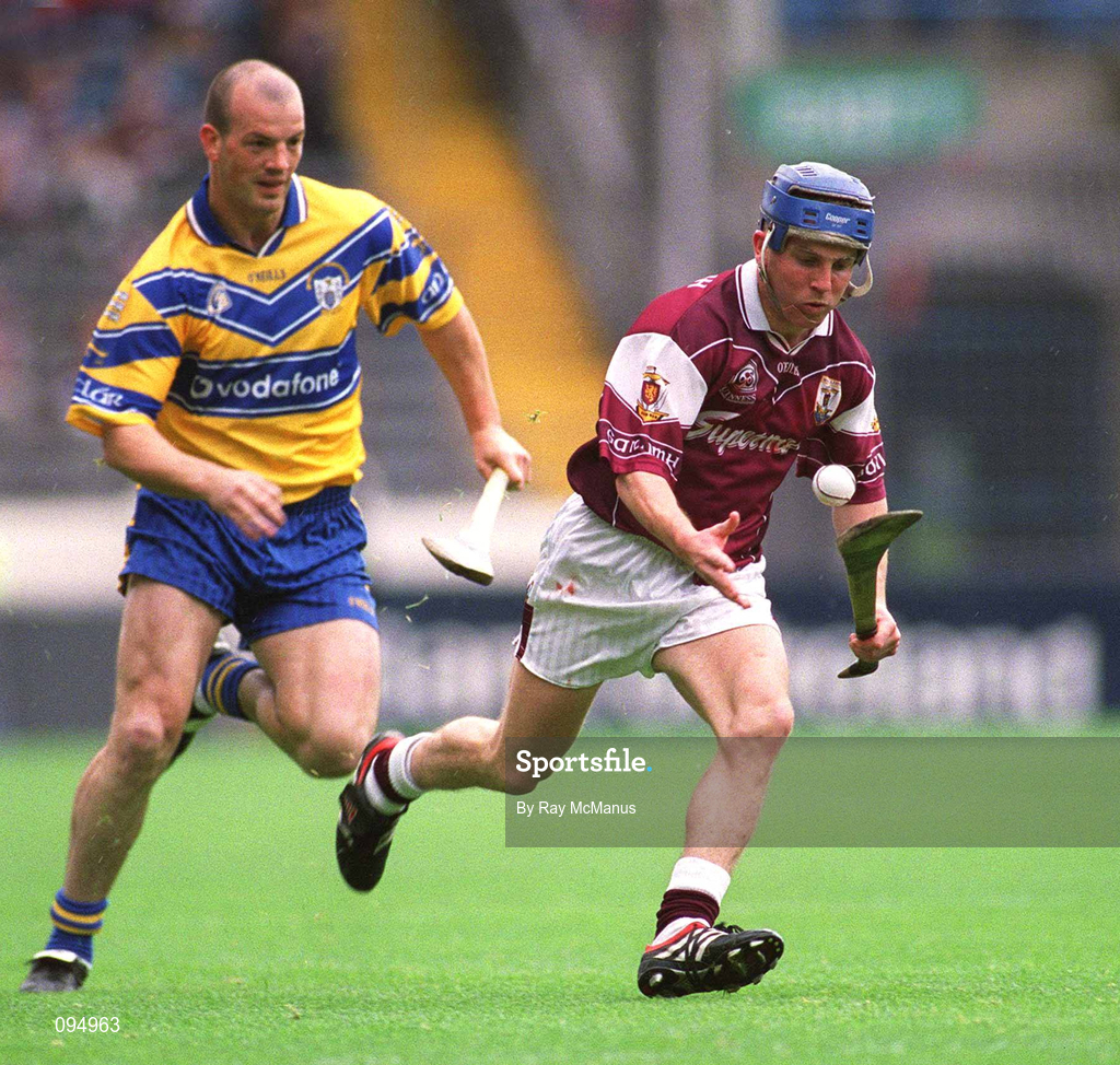 28 July 2002; Kevin Broderick of Galway in action against Ollie Baker of Clare during the Guinness All-Ireland Senior Hurling Championship Quarter-Final match between Clare and Galway at Croke Park. Photo by Ray McManus/Sportsfile