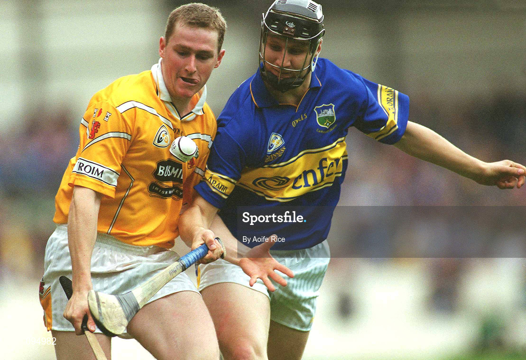 28 July 2002; Paddy Richmond of Antrim in action against Philip Maher of Tipperary during the All-Ireland Senior Hurling Championship Quarter-Final match between Antrim and Tipperary at Croke Park in Dublin. Photo by Aoife Rice/Sportsfile