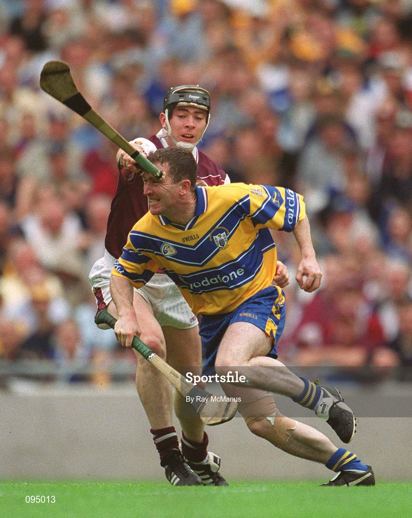 28 July 2002; Eugene Cloonan of Galway breaks his hurl on the forehead of Brian Quinn of Clare as he attempts to prevent him from clearing during the Guinness All-Ireland Senior Hurling Championship Quarter-Final match between Clare and Galway at Croke Park. Photo by Ray McManus/Sportsfile