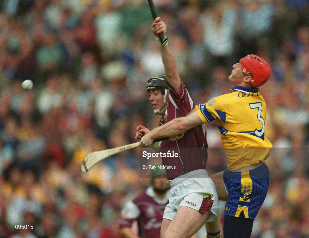 28 July 2002; Eugene Cloonan of Galway in action against Brian Lohan of Clare during the Guinness All-Ireland Senior Hurling Championship Quarter-Final match between Clare and Galway at Croke Park. Photo by Ray McManus/Sportsfile
