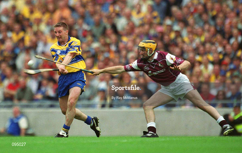 28 July 2002; James O'Connor of Clare gets his shot off despite the efforts of Ger Farragher of Galway during the Guinness All-Ireland Senior Hurling Championship Quarter-Final match between Clare and Galway at Croke Park. Photo by Ray McManus/Sportsfile