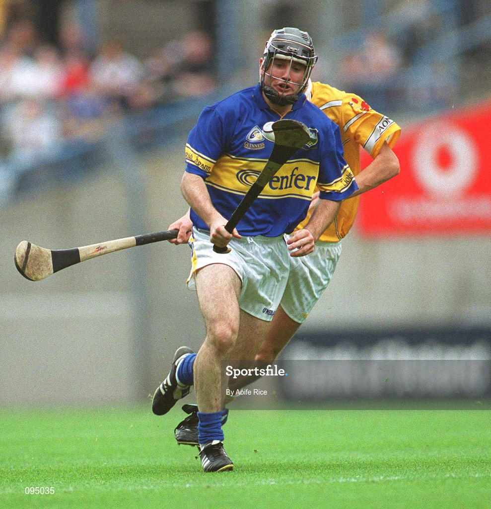 28 July 2002; Eoin Kelly of Tipperary in action against Johnny Campbell of Antrim during the All-Ireland Senior Hurling Championship Quarter-Final match between Antrim and Tipperary at Croke Park in Dublin. Photo by Aoife Rice/Sportsfile