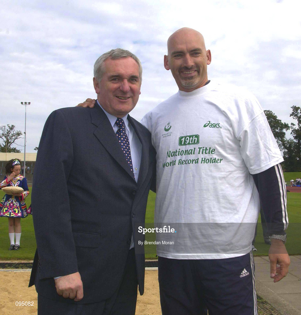 13 July 2002; An Taoiseach Bertie Ahern TD with Terry McHugh of Dublin City Harriers AC, after McHugh won the Men's Javelin title for a World Record 19th consecutive time, at the AAI National Track and Field Championships at the Morton Stadium in Santry, Dublin. Photo by Brendan Moran/Sportsfile