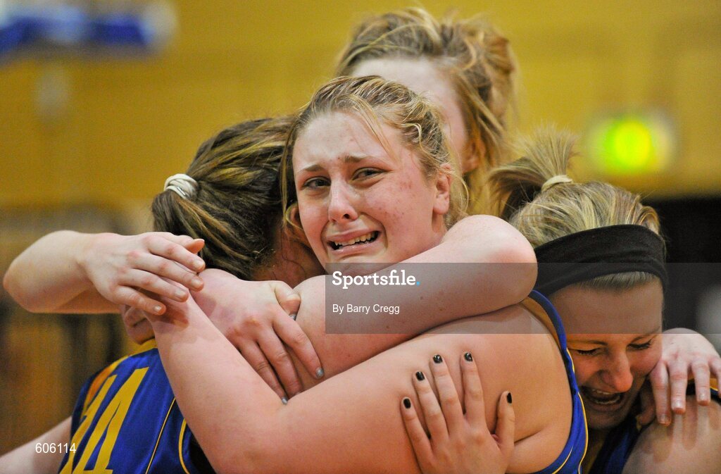 22 March 2012; An elated Laura Wyse, centre, Christ the King, hugs team-mates Hannah McCarthy, left, and Emma Cotter after the game. U16B Girls - All-Ireland Schools League Finals 2012, Mercy Coolock, Dublin v Christ the King, Cork, National Basketball Arena, Tallaght, Dublin. Picture credit: Barry Cregg / SPORTSFILE