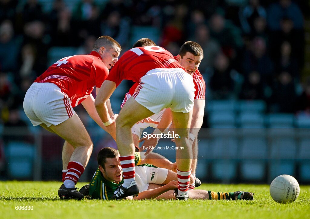 18 March 2012; Patrick Curtin, Kerry, in action against Cork players, from left, Eoin Cotter, Eoin Cadogan and Ray Carey. Allianz Football League, Division 1, Round 5, Cork v Kerry, Pairc Ui Chaoimh, Cork. Picture credit: Stephen McCarthy / SPORTSFILE