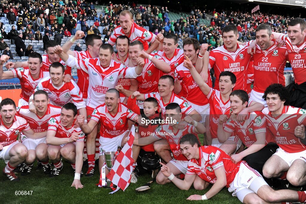 17 March 2012; Members of the Loughgiel Shamrocks squad celebrate with the Tommy Moore Cup. AIB GAA Hurling All-Ireland Senior Club Championship Final, Coolderry, Offaly, v Loughgiel Shamrocks, Antrim, Croke Park, Dublin. Picture credit: Ray McManus / SPORTSFILE