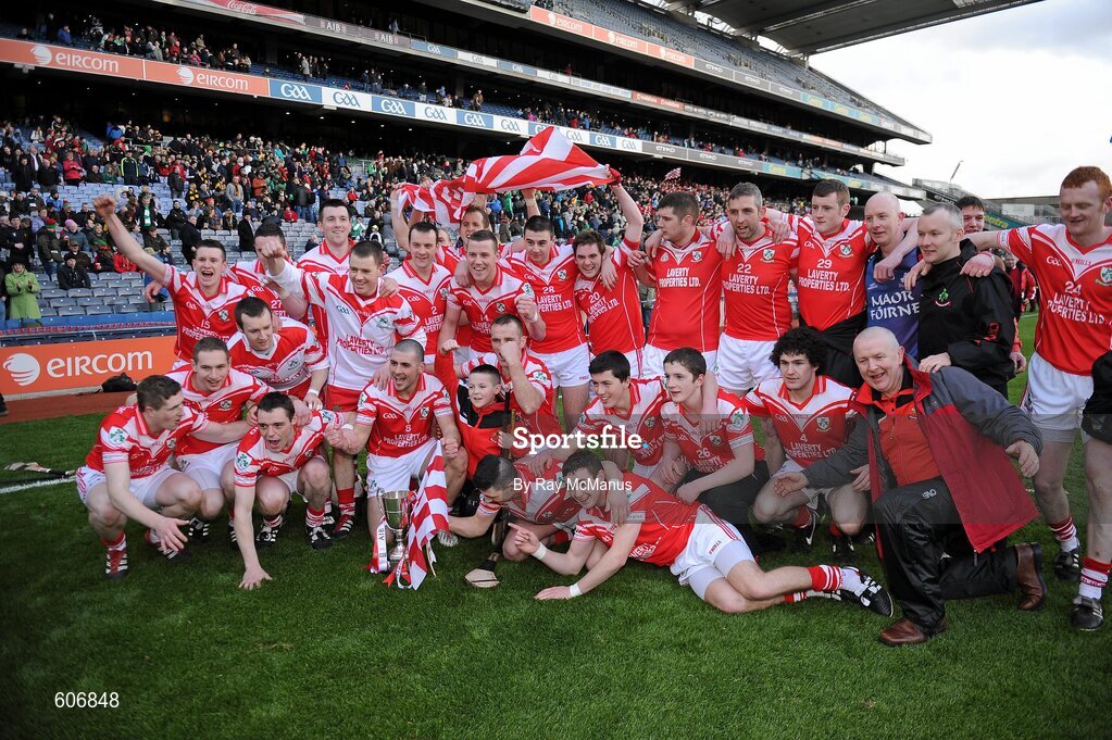 17 March 2012; Members of the Loughgiel Shamrocks squad celebrate with the Tommy Moore Cup. AIB GAA Hurling All-Ireland Senior Club Championship Final, Coolderry, Offaly, v Loughgiel Shamrocks, Antrim, Croke Park, Dublin. Picture credit: Ray McManus / SPORTSFILE