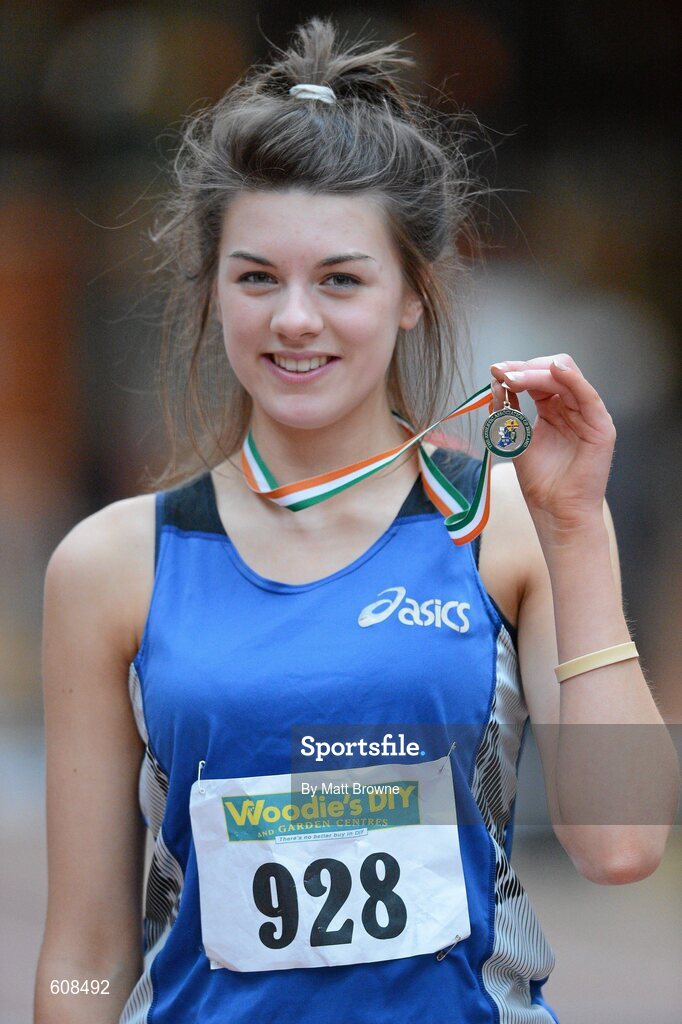 31 March 2012; Winner of the Girls Under 19 High Jump Emily Rogers, St. Peter's Athletic Club, Dromiskin, Co. Louth, with her gold medal. Rogers won the event with a jump of 1.17m. Woodie’s DIY AAI Juvenile Indoor Championships of Ireland, Nenagh Indoor Arena, Nenagh, Co. Tipperary. Picture credit: Matt Browne / SPORTSFILE