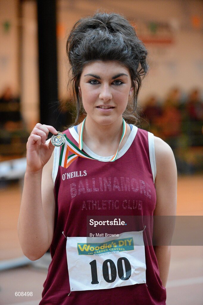 31 March 2012; Winner of the Girls Under 18 800m Laura O'Dowd, Ballinamore Athletic Club, Co. Leitrim, with her gold medal. Woodie’s DIY AAI Juvenile Indoor Championships of Ireland, Nenagh Indoor Arena, Nenagh, Co. Tipperary. Picture credit: Matt Browne / SPORTSFILE