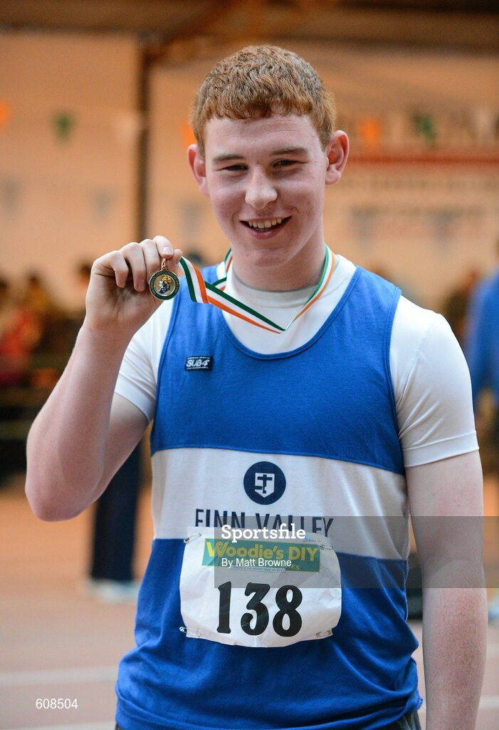 31 March 2012; Winner of the Boys Under 17 Shot Putt John Kelly, Finn Valley Athletic Club, Co. Donegal, with his gold medal. Woodie’s DIY AAI Juvenile Indoor Championships of Ireland, Nenagh Indoor Arena, Nenagh, Co. Tipperary. Picture credit: Matt Browne / SPORTSFILE