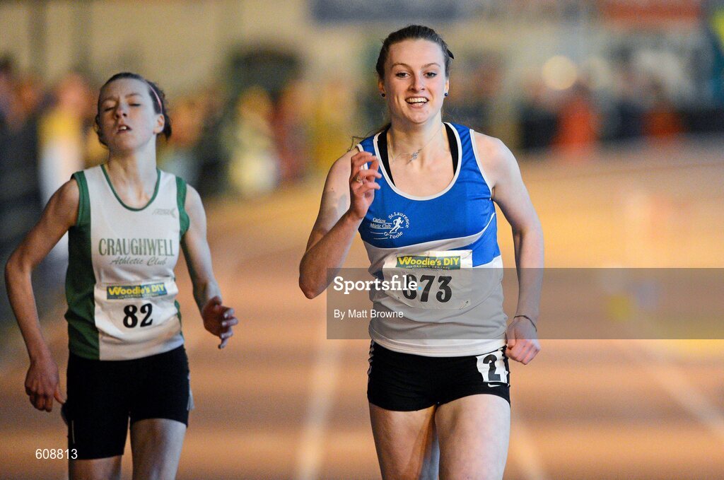31 March 2012; Grace Lawler, St. Laurence O'Toole Athletic Club, Co. Carlow, on her way to winning the Girls Under 16 200m from eventual second place Sinead Treacy, left, Craughwell Athletic Club, Co. Galway, during the Woodie’s DIY AAI Juvenile Indoor Championships of Ireland. Nenagh Indoor Arena, Nenagh, Co. Tipperary. Picture credit: Matt Browne / SPORTSFILE