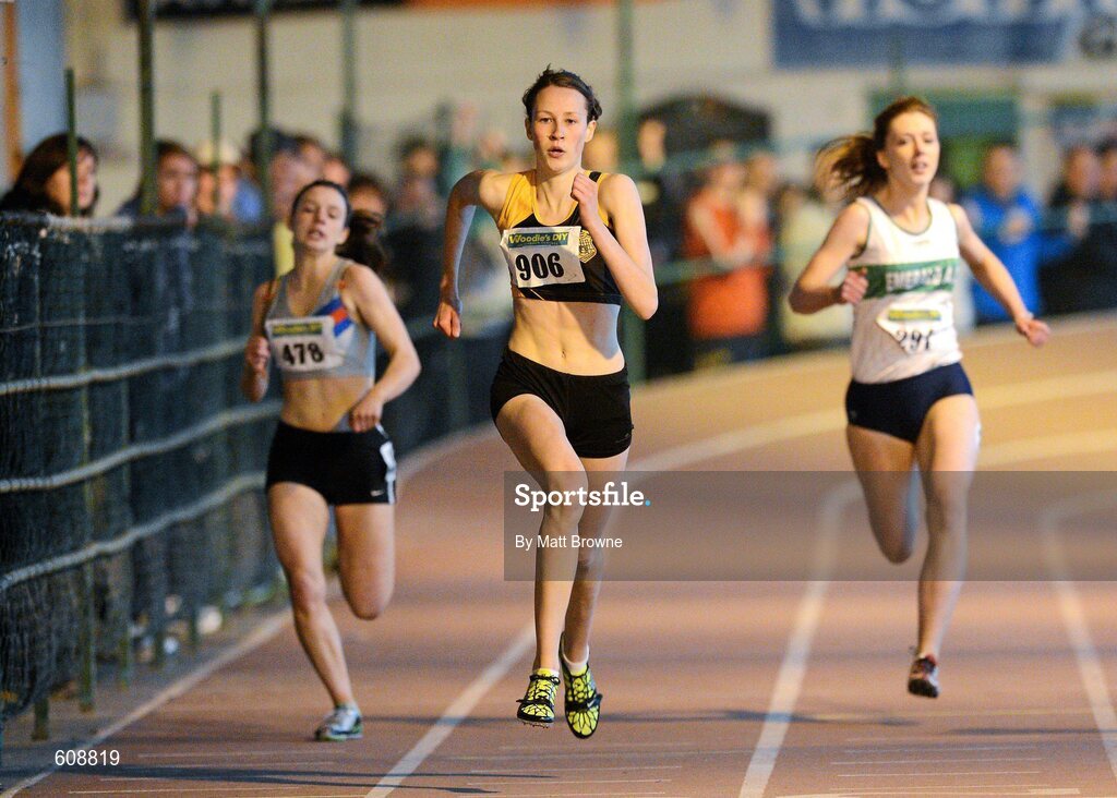 31 March 2012; Cliodhna Manning, Kilkenny City Harriers AC, Co. Kilkenny, on her way to winning the Girls Under 18 200m Final from eventual second place Jade Leahy, left, Dundrum South Dublin AC, Co. Dublin, and Marie Healon, Emerald AC, Co. Limerick, during the Woodie’s DIY AAI Juvenile Indoor Championships of Ireland. Nenagh Indoor Arena, Nenagh, Co. Tipperary. Picture credit: Matt Browne / SPORTSFILE