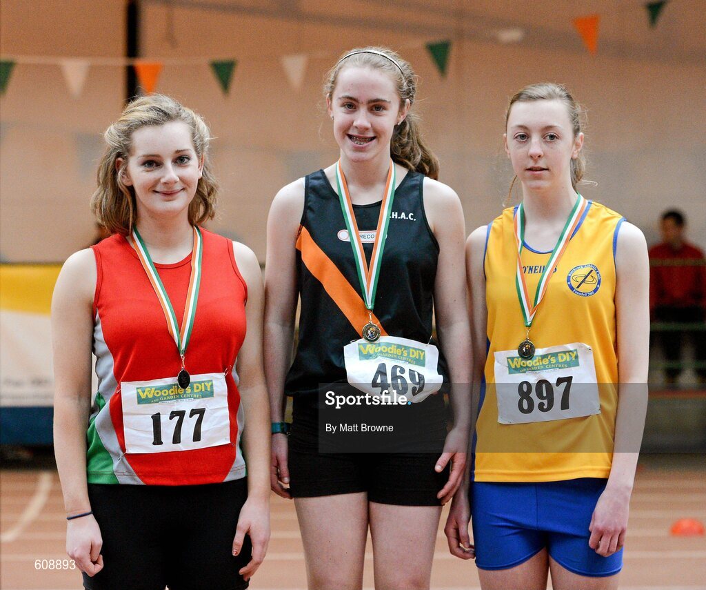 31 March 2012; Winner of the Girls Under 17 Long Jump, Megan Comber, Clonliffe Harriers A.C., Co. Dublin, with second place Aoibhin McManus, left, City of Lisburn A.C., Co. Down and third place Rebecca Carr, right, Blackrock A.C., Co. Louth, during the Woodie’s DIY AAI Juvenile Indoor Championships of Ireland. Nenagh Indoor Arena, Nenagh, Co. Tipperary. Picture credit: Matt Browne / SPORTSFILE
