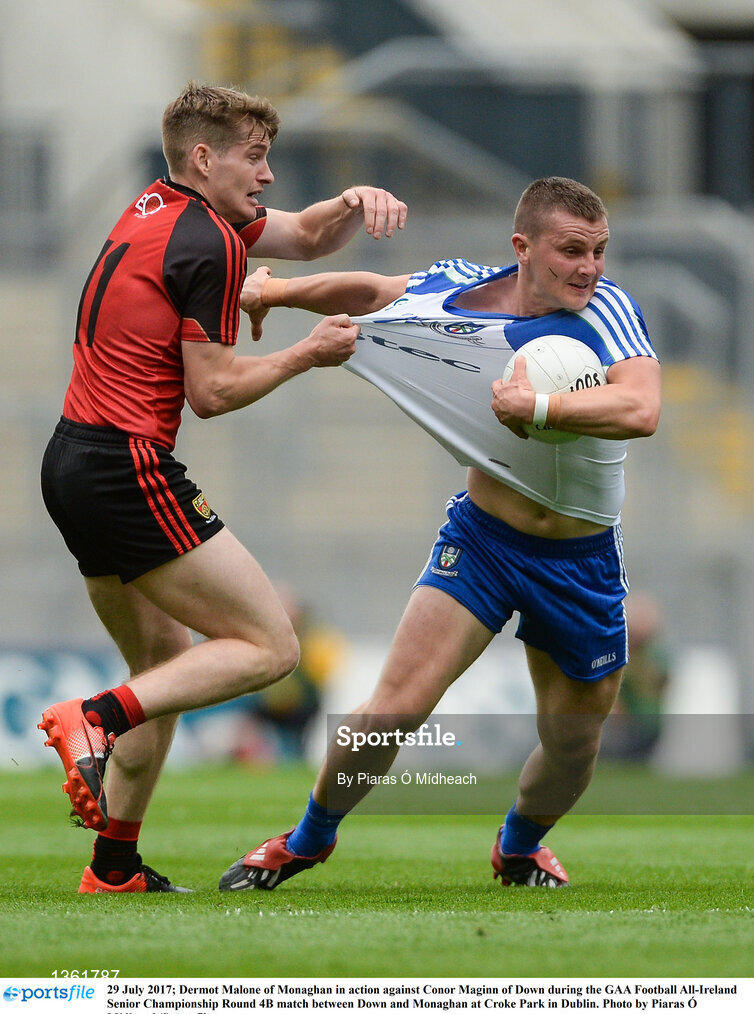29 July 2017; Dermot Malone of Monaghan in action against Conor Maginn of Down during the GAA Football All-Ireland Senior Championship Round 4B match between Down and Monaghan at Croke Park in Dublin. Photo by Piaras Ó Mídheach/Sportsfile