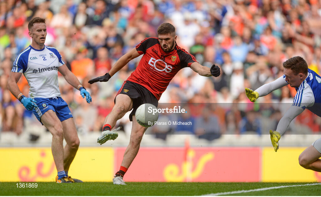 29 July 2017; Connaire Harrison of Down kicks a second half point, after the ball rebounded off the post, under pressure from Monaghan goalkeeper Rory Beggan during the GAA Football All-Ireland Senior Championship Round 4B match between Down and Monaghan at Croke Park in Dublin. Photo by Piaras Ó Mídheach/Sportsfile