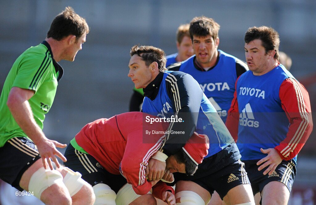 4 April 2012; Munster's James Coughlan, supported by Donnacha Ryan, is tackled by David Wallace, supported by Donncha O'Callaghan and Damien Varley, right, during squad training ahead of their Heineken Cup Quarter-Final game against Ulster on Sunday. Munster Rugby Squad Training, Thomond Park, Limerick. Picture credit: Diarmuid Greene / SPORTSFILE