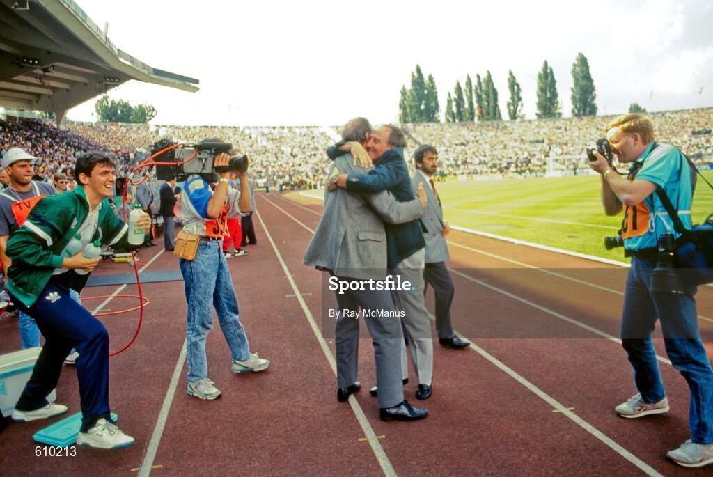 12 June 1988; Republic of Ireland manager Jack Charlton is hugged by assistant manager Maurice Setters after the UEFA European Football Championship Finals Group B match between England and Republic of Ireland at Neckarstadion in Stuttgart, Germany. Photo by Ray McManus/Sportsfile
