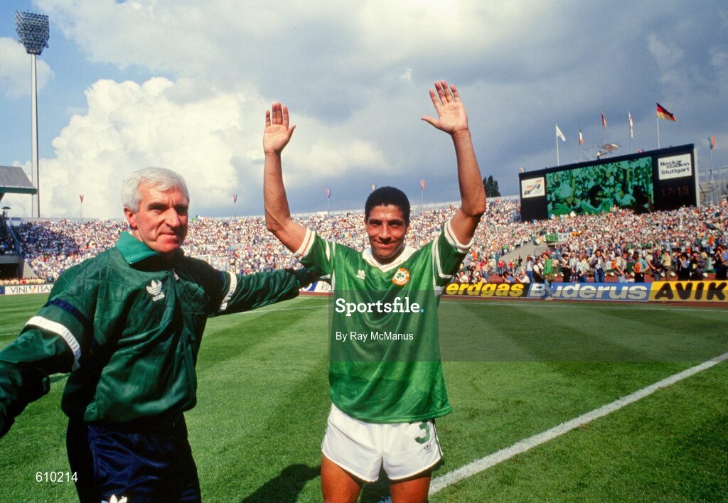 12 June 1988; Chris Hughton of Republic of Ireland and physio Mick Byrne celebrate after the UEFA European Football Championship Finals Group B match between England and Republic of Ireland at Neckarstadion in Stuttgart, Germany. Photo by Ray McManus/Sportsfile