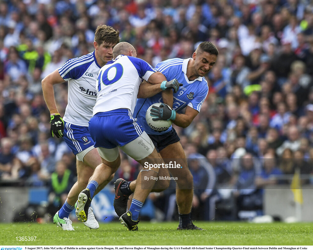 5 August 2017; James McCarthy of Dublin in action against Gavin Doogan, 10, and Darren Hughes of Monaghan during the GAA Football All-Ireland Senior Championship Quarter-Final match between Dublin and Monaghan at Croke Park in Dublin. Photo by Ray McManus/Sportsfile