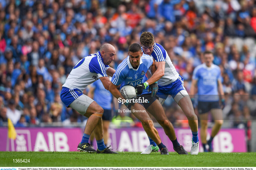 5 August 2017; James McCarthy of Dublin in action against Gavin Doogan, left, and Darren Hughes of Monaghan during the GAA Football All-Ireland Senior Championship Quarter-Final match between Dublin and Monaghan at Croke Park in Dublin. Photo by Daire Brennan/Sportsfile