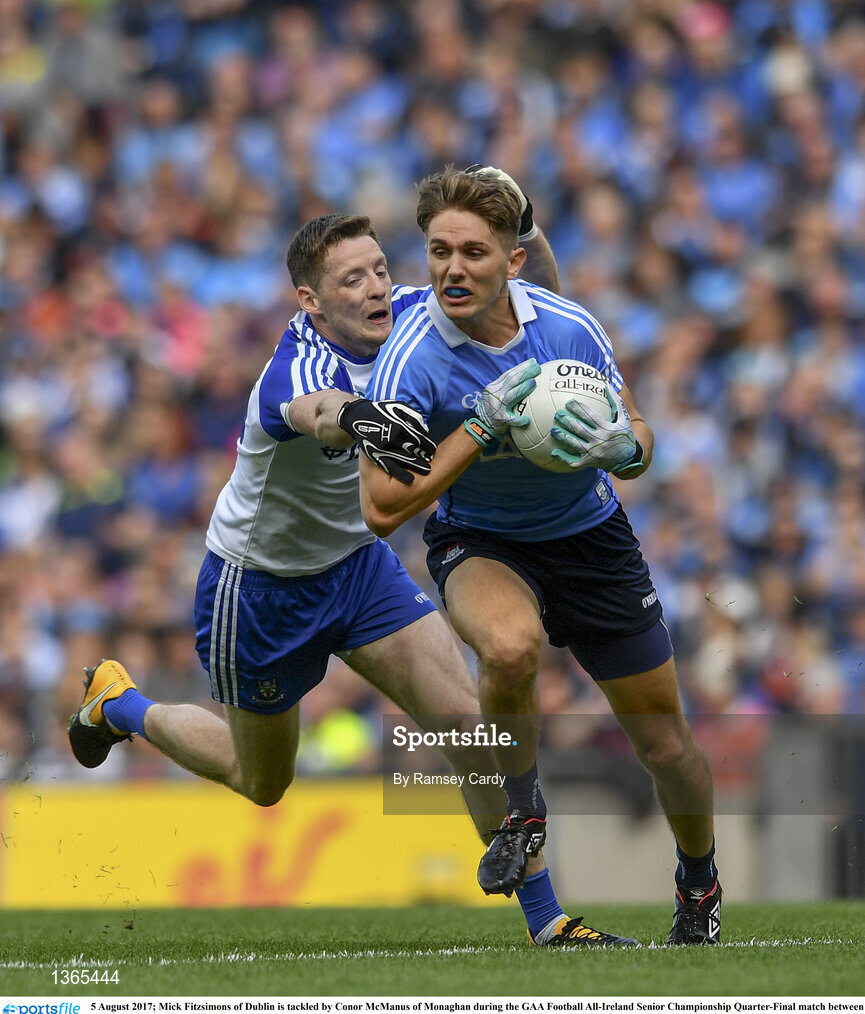 5 August 2017; Mick Fitzsimons of Dublin is tackled by Conor McManus of Monaghan during the GAA Football All-Ireland Senior Championship Quarter-Final match between Dublin and Monaghan at Croke Park in Dublin. Photo by Ramsey Cardy/Sportsfile