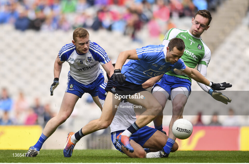 5 August 2017; Dean Rock of Dublin is tackled by Colin Walshe, left, Drew Wylie, centre, and Rory Beggan of Monaghan during the GAA Football All-Ireland Senior Championship Quarter-Final match between Dublin and Monaghan at Croke Park in Dublin. Photo by Ramsey Cardy/Sportsfile