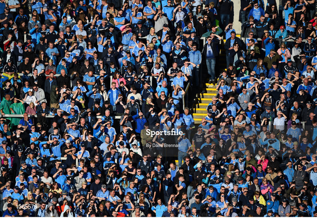 5 August 2017; Dublin supporters on Hill 16 cover their eyes from the sun during the GAA Football All-Ireland Senior Championship Quarter-Final match between Dublin and Monaghan at Croke Park in Dublin. Photo by Daire Brennan/Sportsfile