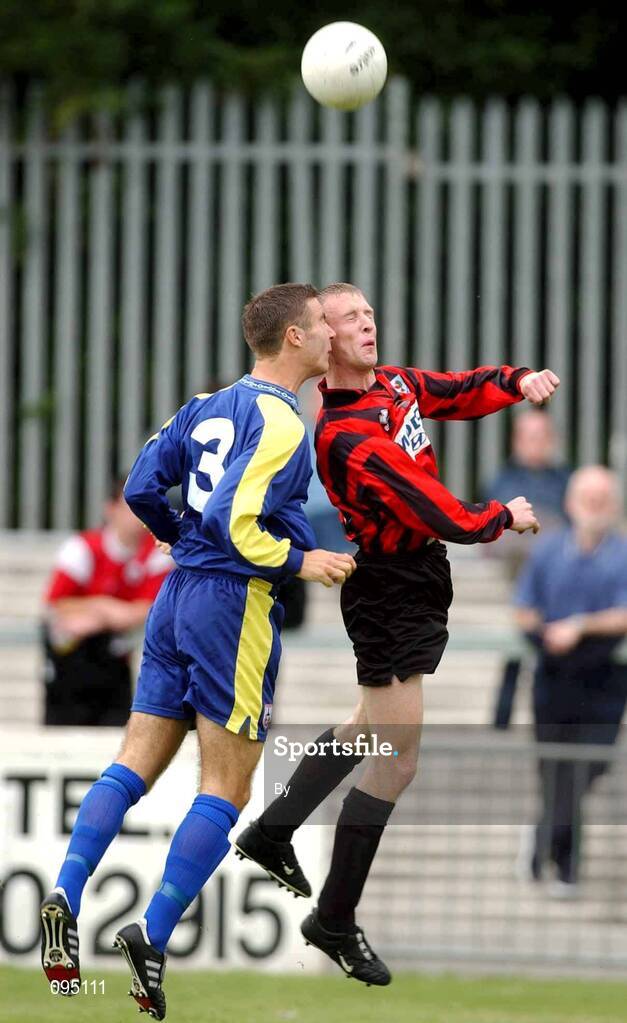 28 July 2002; Sean Dillon, Longford Town, in action against CIE Ranch's Niall Black. CIE Ranch v Longford Town, FAI Carlsberg Senior Cup, second round, Richmond Park, Dublin. Soccer. Picture credit; David Maher / SPORTSFILE *EDI*