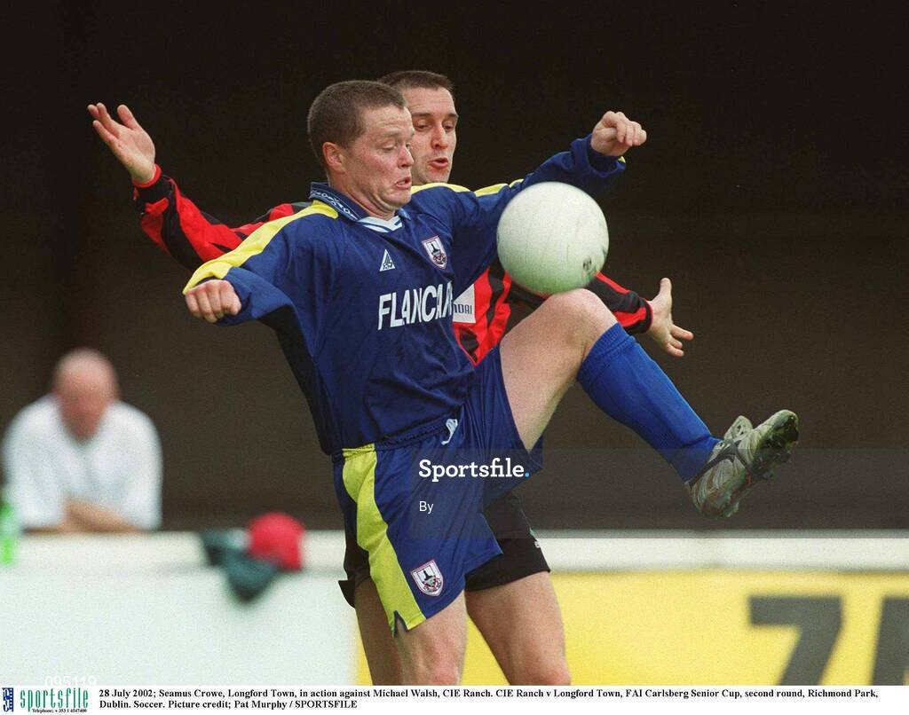 28 July 2002; Seamus Crowe, Longford Town, in action against Michael Walsh, CIE Ranch. CIE Ranch v Longford Town, FAI Carlsberg Senior Cup, second round, Richmond Park, Dublin. Soccer. Picture credit; Pat Murphy / SPORTSFILE