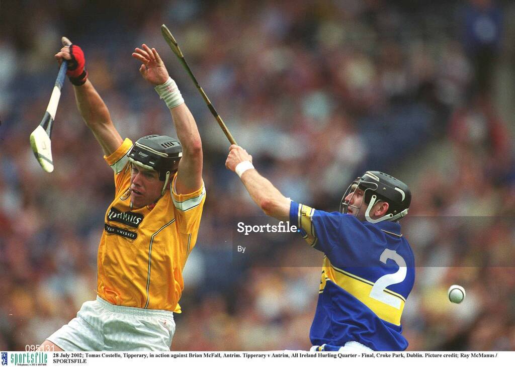 28 July 2002; Tomas Costello, Tipperary, in action against Brian McFall, Antrim. Tipperary v Antrim, All Ireland Hurling Quarter - Final, Croke Park, Dublin. Picture credit; Ray McManus / SPORTSFILE