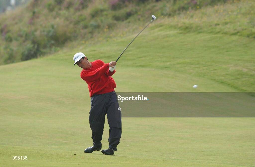 28 July 2002; Noboru Sugai plays his second shot from the first fairway during the Senior British Open at Royal County Down Golf Club, Newcastle, Co. Down. Golf. Picture credit; Matt Browne / SPORTSFILE *EDI*