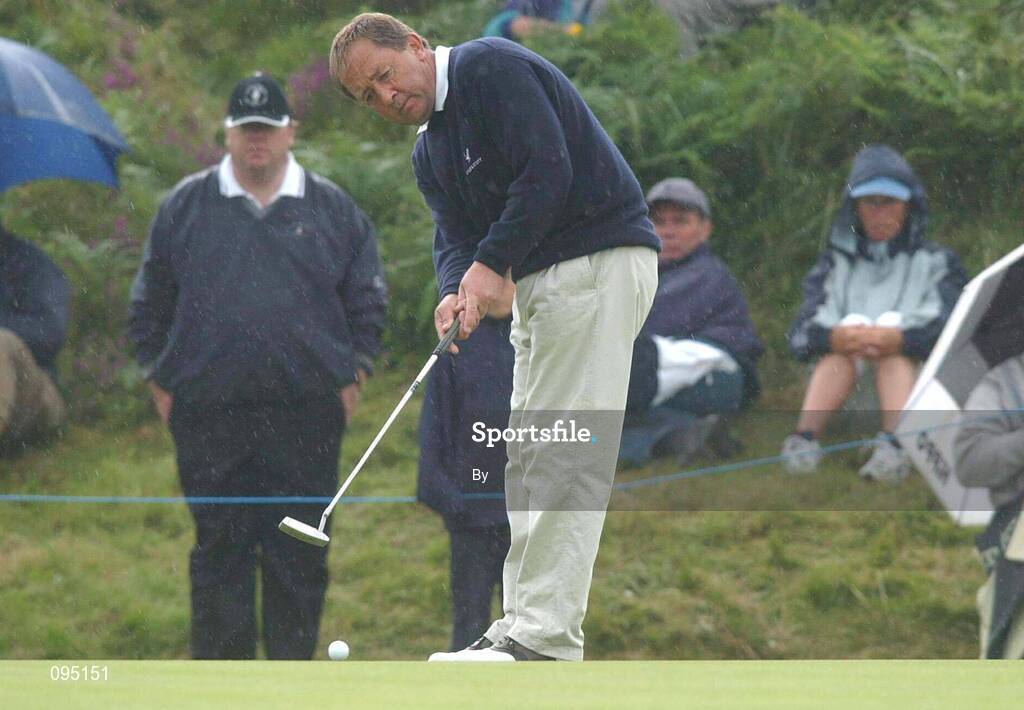 28 July 2002; John Chillas watches his putt on the 5th green during the Senior British Open at Royal County Down Golf Club, Newcastle, Co. Down. Golf. Picture credit; Matt Browne / SPORTSFILE *EDI*
