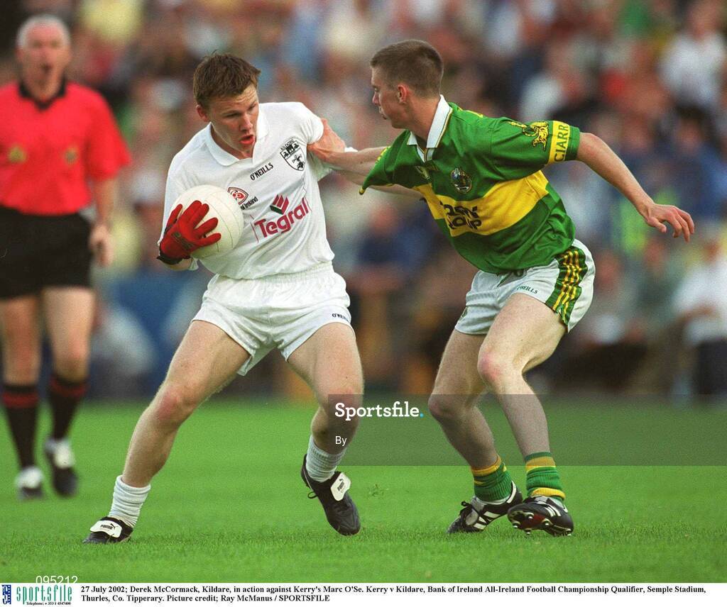 27 July 2002; Derek McCormack, Kildare, in action against Kerry's Marc O'Se. Kerry v Kildare, Bank of Ireland All-Ireland Football Championship Qualifier, Semple Stadium, Thurles, Co. Tipperary. Picture credit; Ray McManus / SPORTSFILE