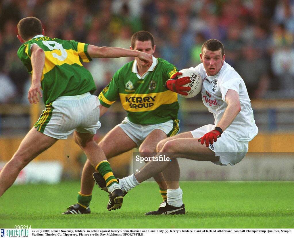 27 July 2002; Ronan Sweeney, Kildare, in action against Kerry's Eoin Brosnan and Donal Daly (9). Kerry v Kildare, Bank of Ireland All-Ireland Football Championship Qualifier, Semple Stadium, Thurles, Co. Tipperary. Picture credit; Ray McManus / SPORTSFILE